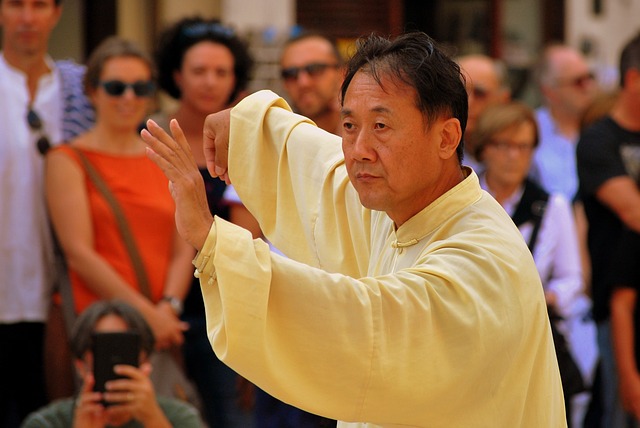 A man performing taiji to demonstrate the difference between ji and qi