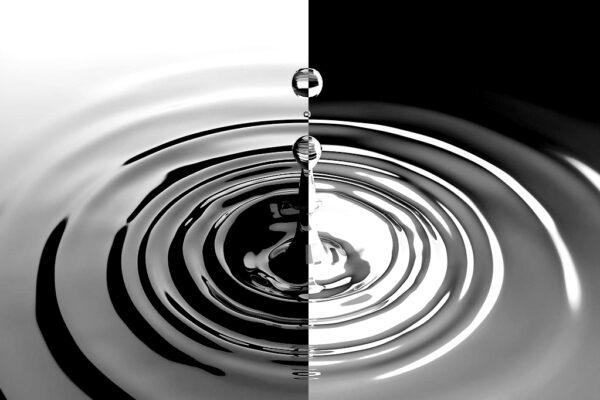 Black and white drop of water to show the seemly dual nature of our experience