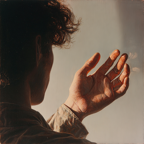 Person looking at their hand to show the importance of interoception