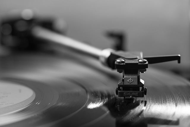 A record player playing music to draw attention to the focus of this article on the effect music can have within our qigong practice