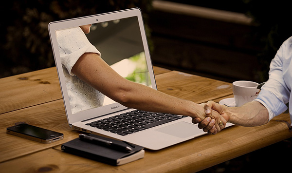 Virtual connection of two people to show the different qualities of online vs in-person learning qigong